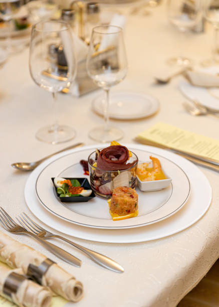 Dish food arrangement, plating at festive table in the restaurant