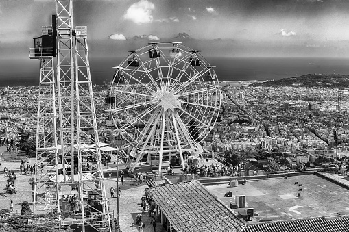 BARCELONA - AUGUST 12: Scenic view over the Tibidabo Amusement Park, Barcelona, Catalonia, Spain on August 12, 2017. The park opened in 1905 and is among the oldest in the world still functioning