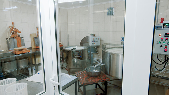 Cheese factory behind the glass door