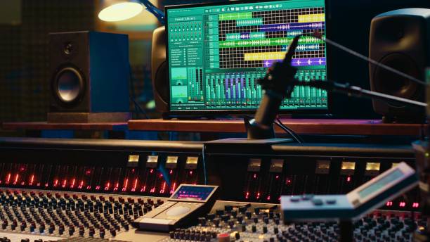 istock Empty control room filled with buttons and sliders used for recording 2135033055