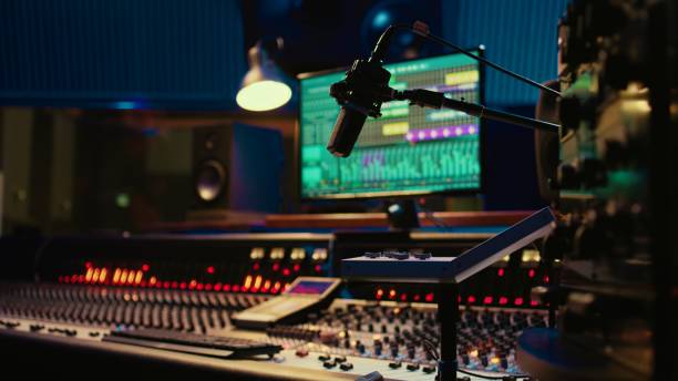 istock Music recording studio control room with pre amp knobs used for volume level 2135034103