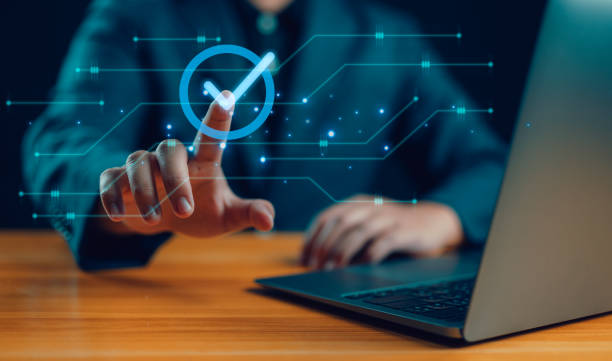 istock Service guarantee, Validation concept for business process automation, quality assurance management, certification, digital transformation. Businessman touching checked icon on virtual screen. 2135038785