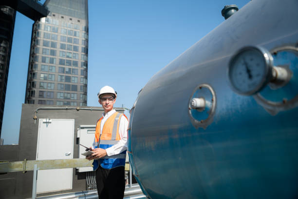istock Engineers inspect the completed air conditioning and water systems to continue verifying their functionality. 2135048938