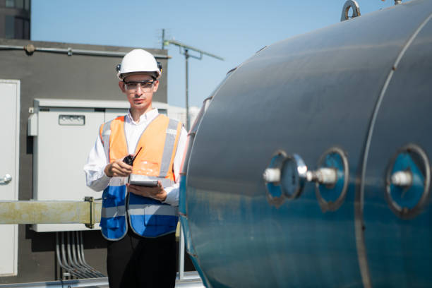 istock Engineers inspect the completed air conditioning and water systems to continue verifying their functionality. 2135048943