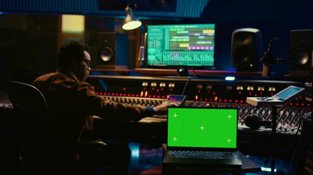 istock African american artist working with mockup on display in control room 2135048950