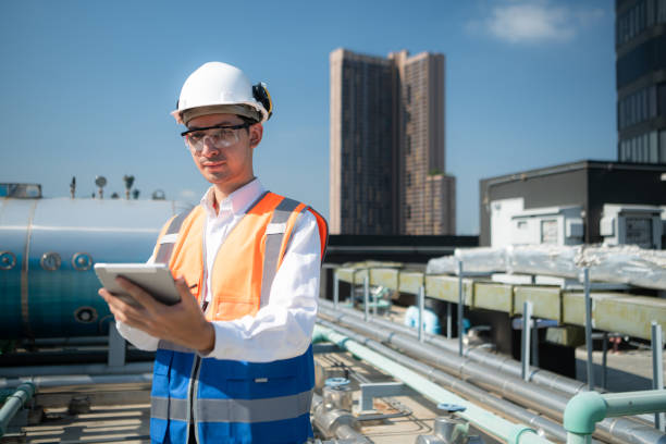 istock Engineers inspect the completed air conditioning and water systems to continue verifying their functionality. 2135049510