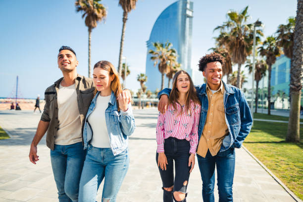 istock friends walking in barceloneta 2135050591