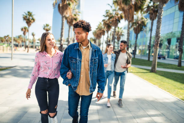 istock friends walking in barceloneta 2135056573