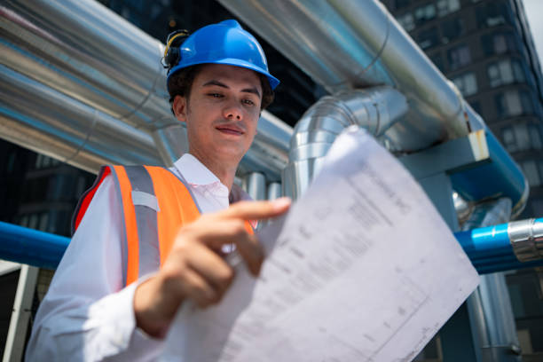 istock Engineers inspect the completed air conditioning and water systems to continue verifying their functionality. 2135059780