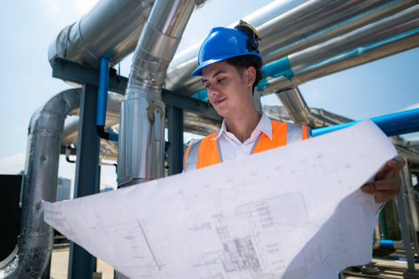 istock Engineers inspect the completed air conditioning and water systems to continue verifying their functionality. 2135060825