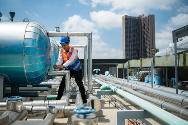 istock Engineers inspect the completed air conditioning and water systems to continue verifying their functionality. 2135061368