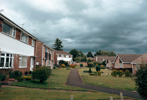 Suburban Housing Under A Dark Stormy Sky