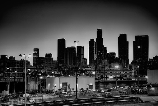 The silhouette of Los Angeles downtown with lights on