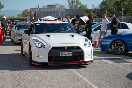 Montmelo, Spain – October 20, 2023: Front view of a white Nissan GT-R35 at a Japanese sports car meet.