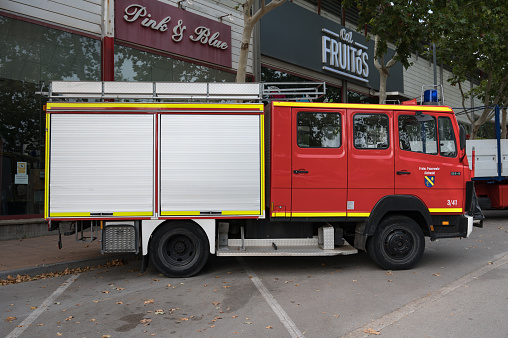 Caldes de Montbui, Spain – October 20, 2023: Side view of the Mercedes Benz 814 LF8 fire truck used by the Feuerwehr Aichwald, a fire station in Germany, 1986 model with Ziegler chassis