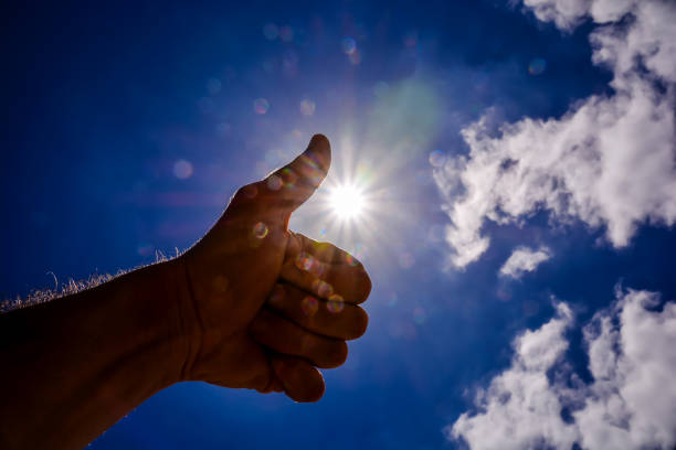 istock Hand over the Sky and Sun 2135134316
