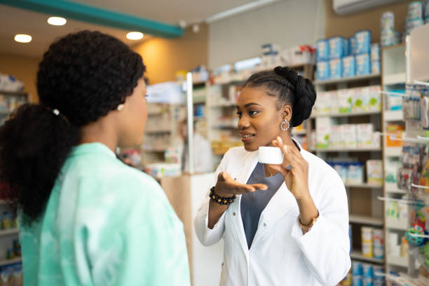 istock Pharmacist recommending product to a customer 2135178884