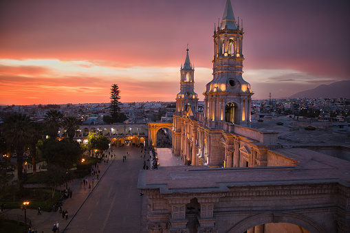 Sunset and evening atmosphere with Basilica Cathedral of Arequipa. Peru.