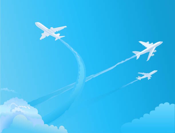 istock Aircraft in the sky. Airplanes with trails, blue sky 2135196588
