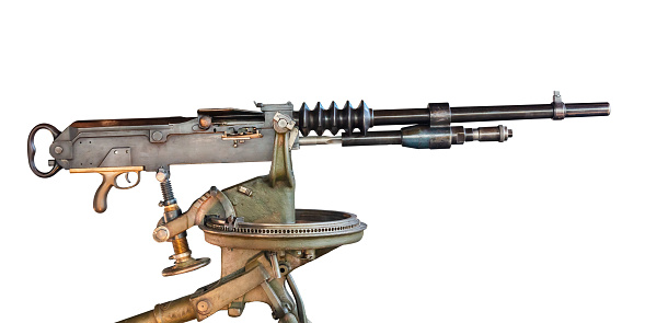 Ancient heavy machine gun isolated on a white background