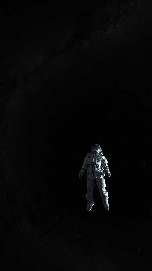 Spaceman on a black background hovering in an outer space. Astronaut in a space