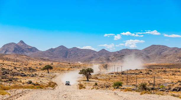 4x4 vehicle traveling on gravel road in the Richtersveld National Park, South Africa