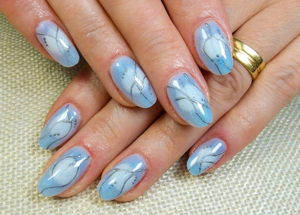 istock Close-up of a professional modern gel manicure 2135282398