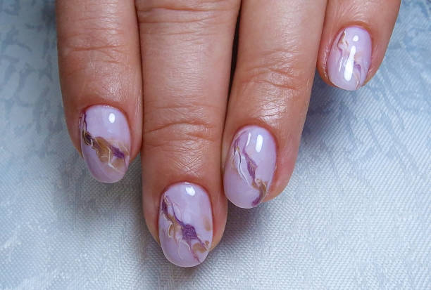 istock Close-up of a professional modern gel manicure 2135283432