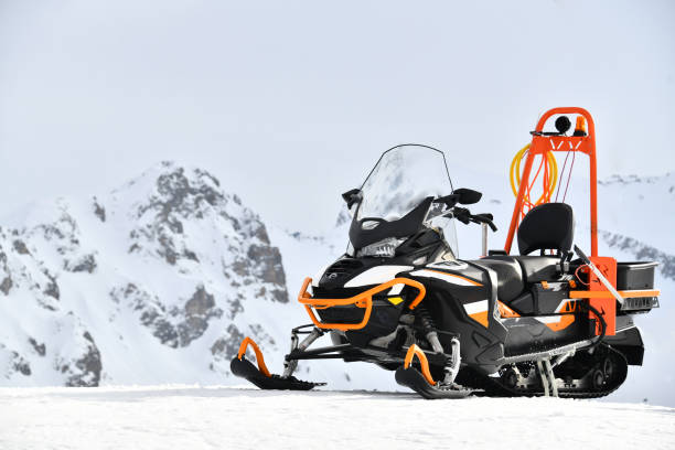 Snowmobile on the slopes of ski resort Courchevel by winter