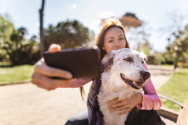 woman take a selfie with the dog