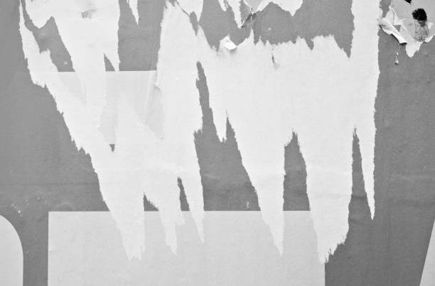 istock Old ripped torn black and white posters textures backgrounds grunge creased crumpled paper vintage collage placards empty space text 2135308220