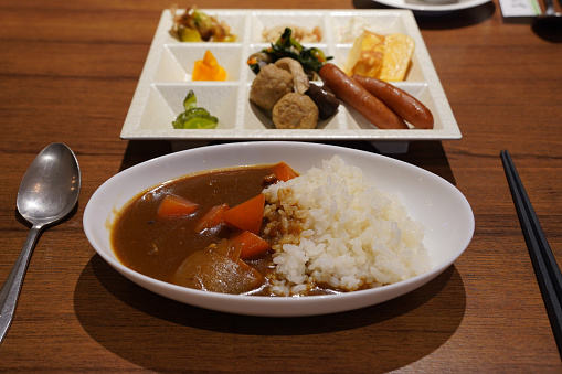 Rice with curry and meatballs in a Japanese restaurant