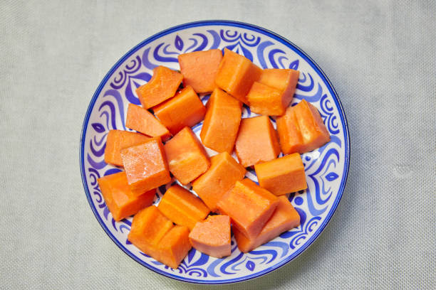 Ripe papaya sliced on plate