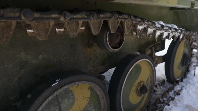 Mid-20th century tractor's rollers and tracks