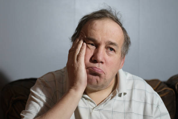 Autistic male with serious expressions