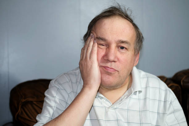 istock Autistic male with serious expressions 2135357032