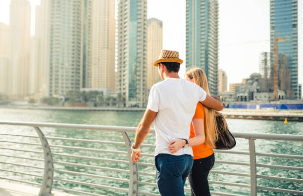 istock Couple in Dubai Marina walking togethers 2135367990