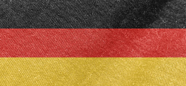 Germany flag fabric cotton material wide flag wallpaper, Textured national flag of Germany for graphic and web design purposes.