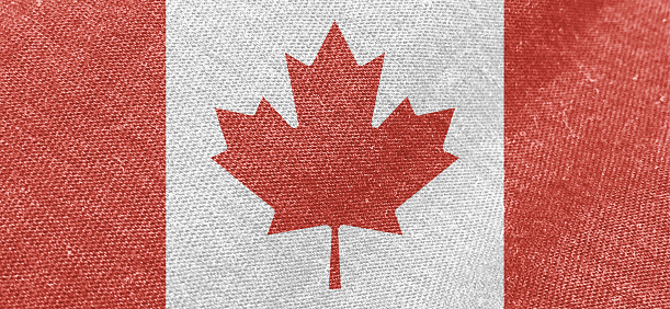 Canada flag fabric cotton material wide flag wallpaper, Textured national flag of Canada for graphic and web design purposes.