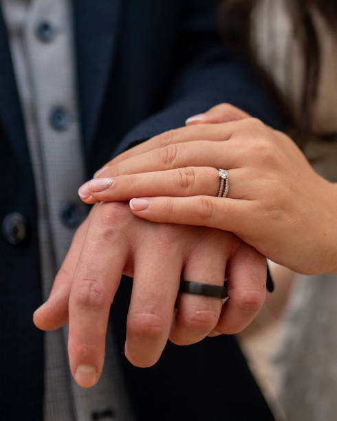 istock Wedding Rings on Bride and Groom 2135454745