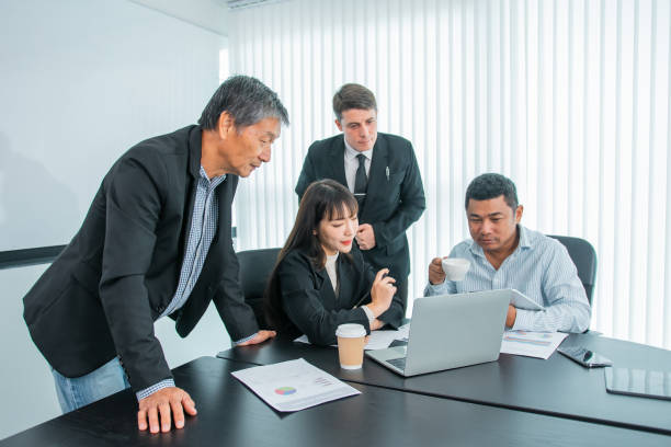 istock Business people  team work while working in board room, design project, discussing ideas,discuss financial statistics together teamwork concept 2135467713
