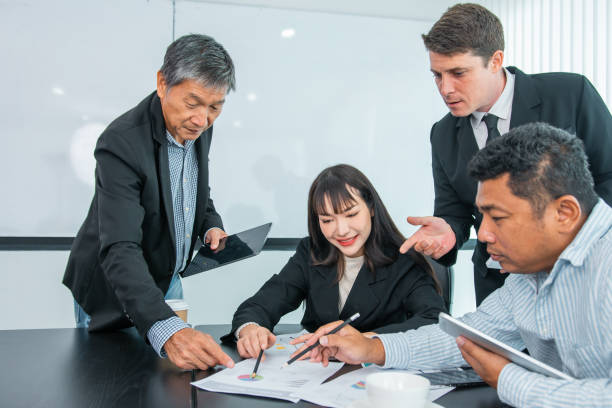 istock Business people  team work while working in board room, design project, discussing ideas,discuss financial statistics together teamwork concept 2135473548