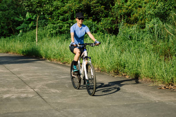 istock Riding bike in summer forest 2135510337
