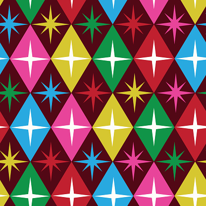 Mid century modern atomic starburst on retro diamond shapes seamless pattern in blue, green, red, pink and yellow on dark background. For home décor, textile and fabric