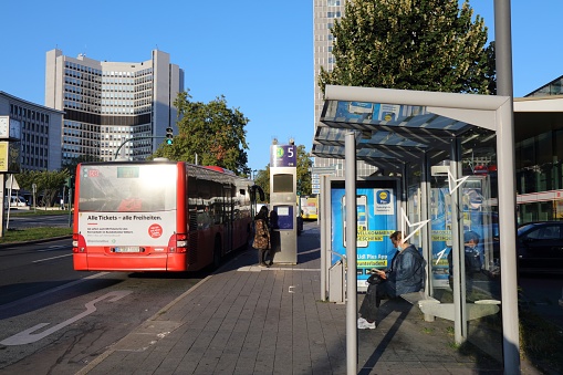 People board city bus in Essen, Germany. Essen is the 9th biggest city in Germany.