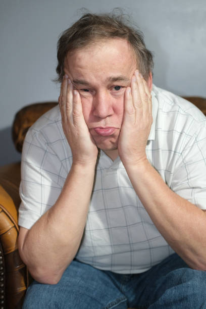 Autistic male with serious expressions