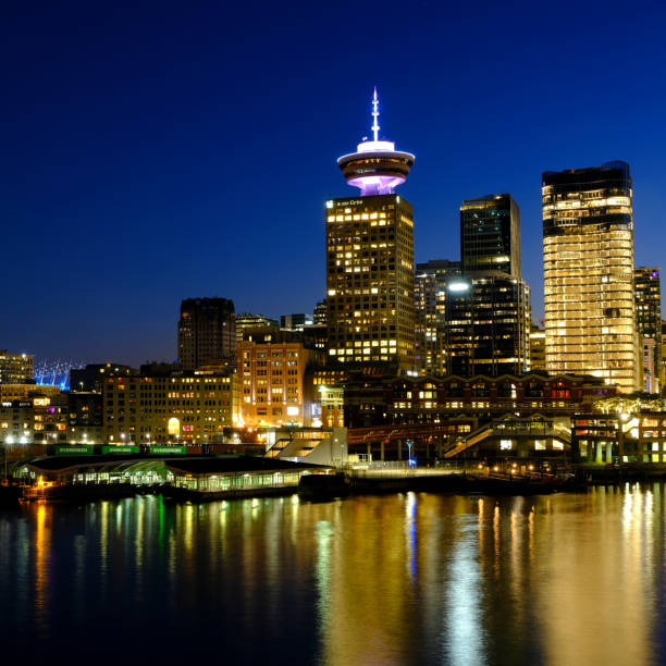istock Vancouver British Columbia Canada City Skyline at Night Reflected in Water 2135568976