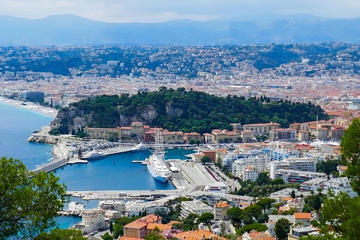 Aerial view of Split harbor, sea, and mountains from hilltop: The Port of Nice and Castle Hill, France