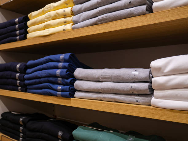 istock Colored polo shirt neatly placed on the shelf 2135624602