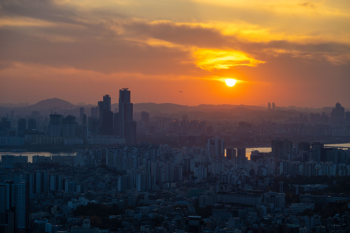 Aerial view of the capital city of Seoul in South Korea, seen at sunset.